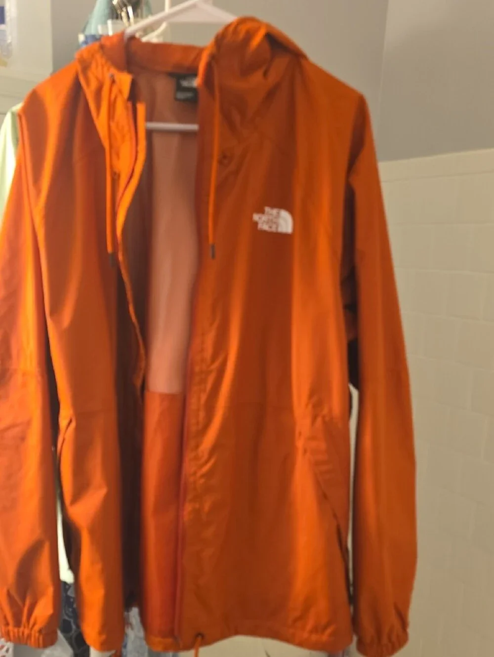The North Face Bright Orange Hooded Windbreaker Jacket